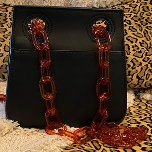 Super cute black small bag can be worn as Crossbody or shoulder bag like new